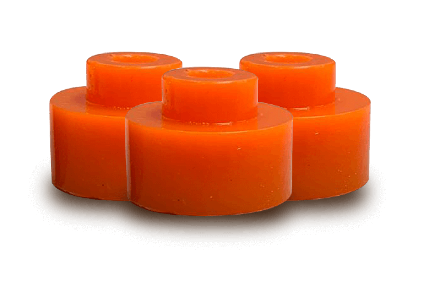 Three orange cylindrical objects, stacked, on plain background.